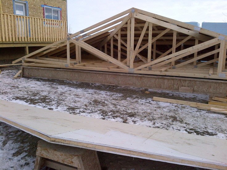 We also sheeted the roof in the background and put some drywall on the wall in the foreground. 