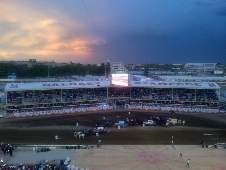 Chuckwagon races against a beautiful sky! 