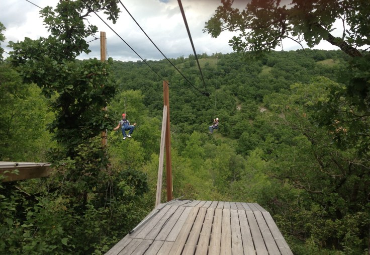 Derek and Keith racing on the double zipline. 