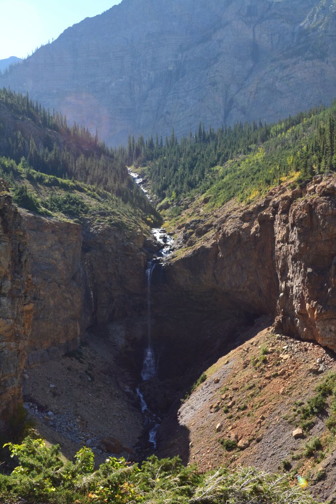 A waterfall on the side of the mountain. We stood beside it.