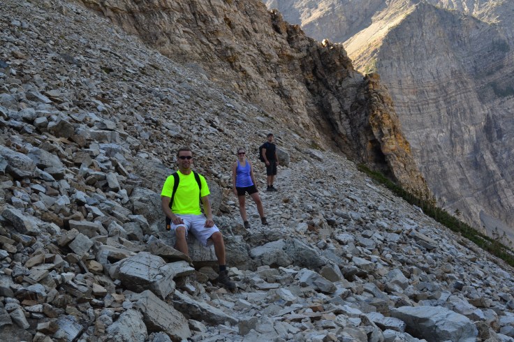 Taking a break for a quick photo on the side of the mountain. The loose rock was very hard to walk on.