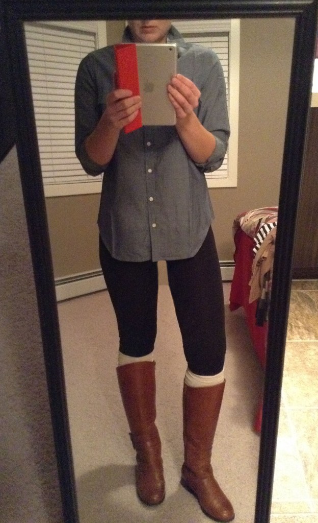 Leggings, denim shirt and riding boots. 