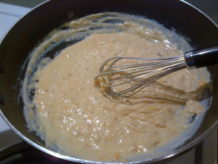 Mix ingredients for the cheese sauce. 