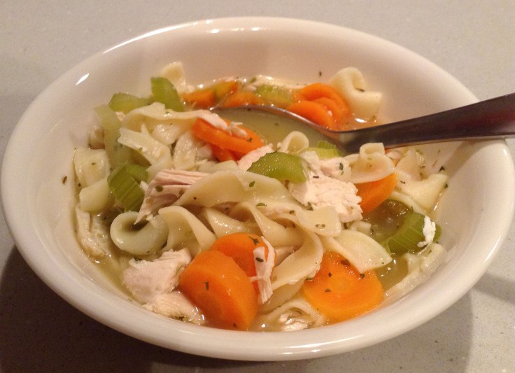A hearty bowl of chicken noodle soup. 
