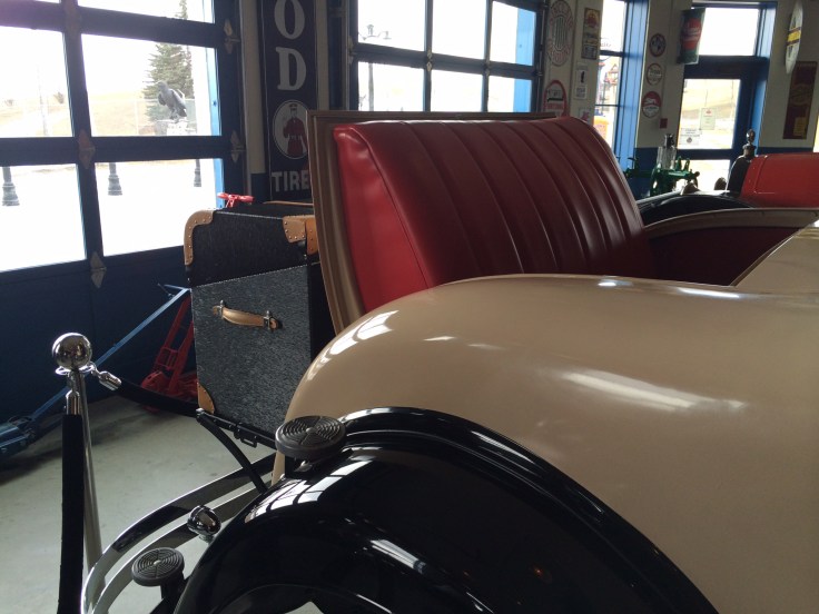I learned that this is called a rumble seat. Ladies had to climb in and out of this seat while wearing a long dress and also not showing  their ankles. 