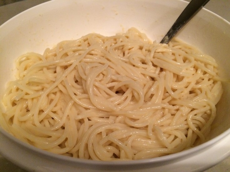 Spaghetti mixed with eggs and cheeses. 